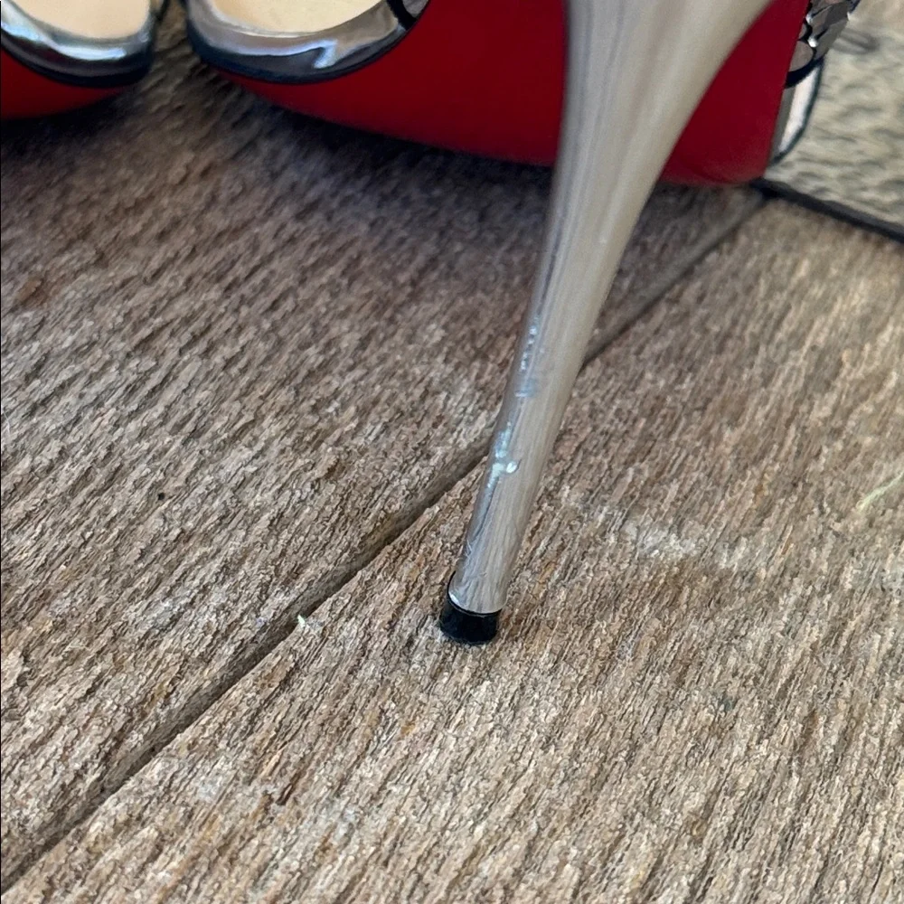 Christian Louboutin preowned please